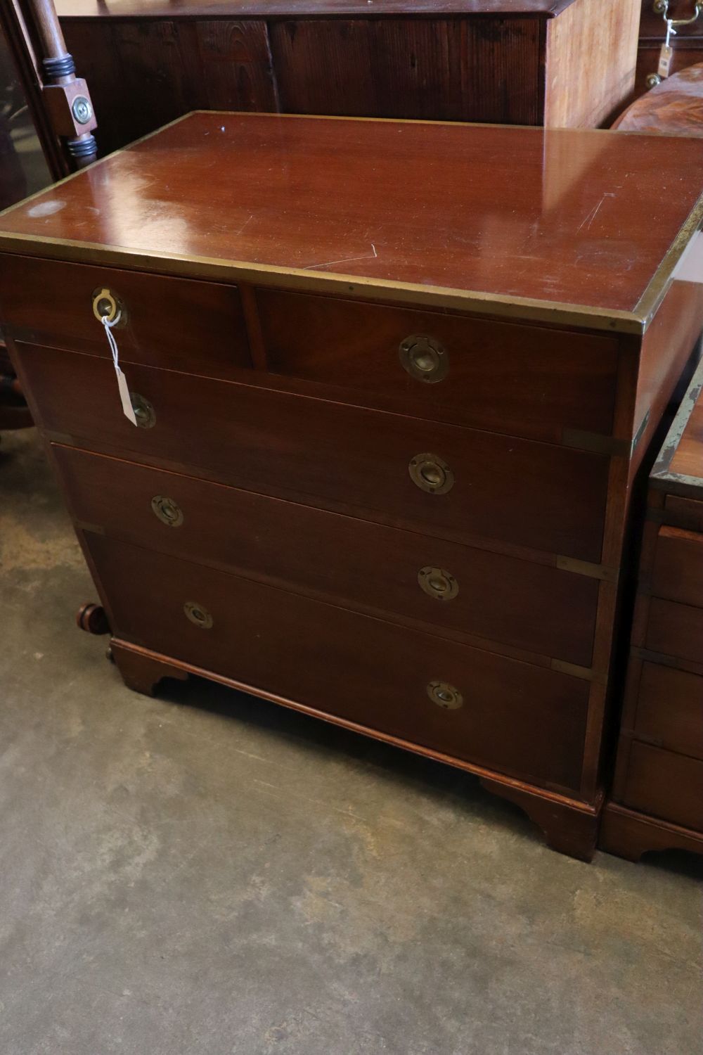 A brass mounted yew wood campaign style chest of three short and four graduated long drawers, width 77cm height 90cm and another simila